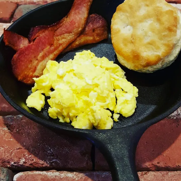 Post Exchange Catering breakfast of bacon, scrambled eggs and a biscuit